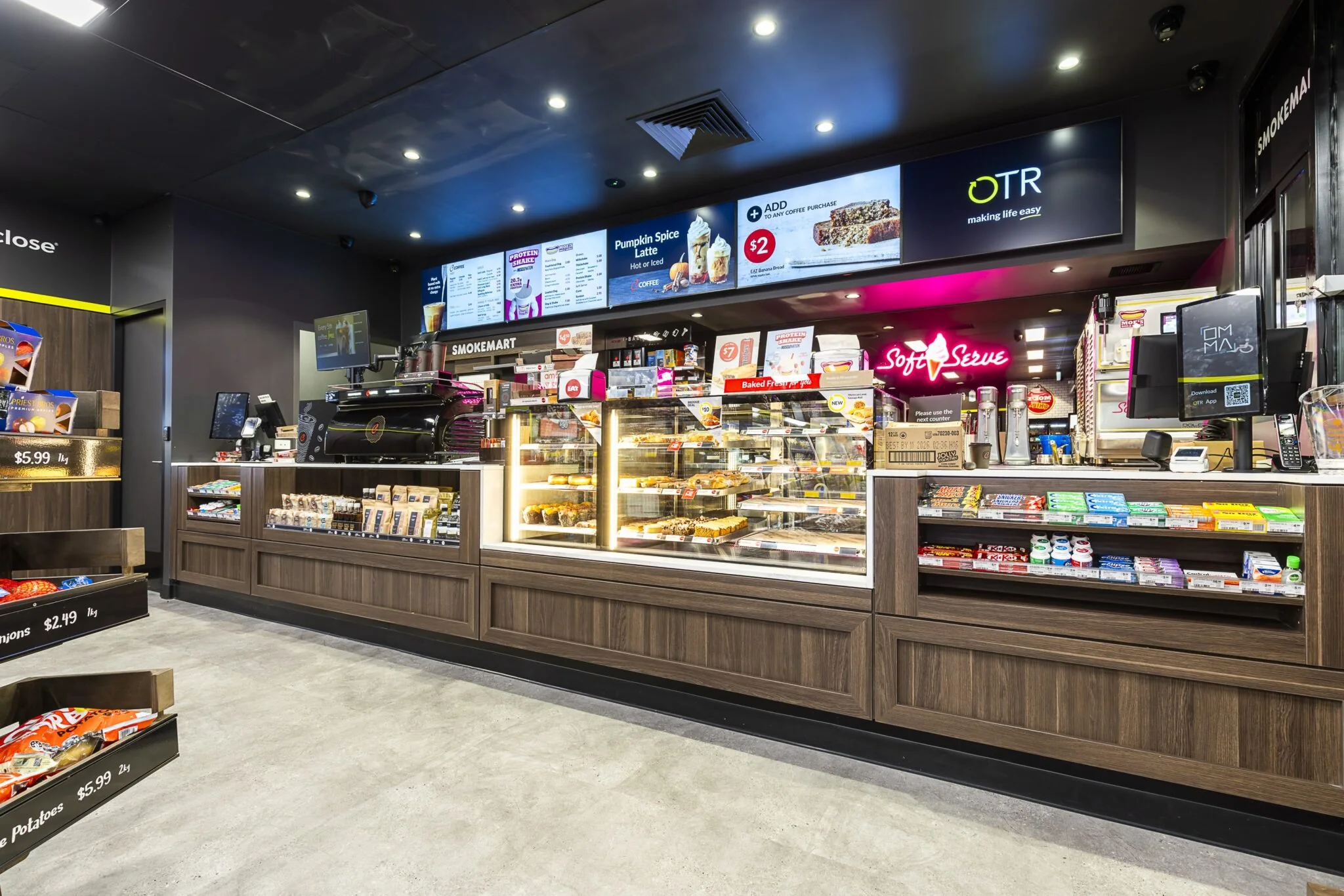 Retail coffee counter with timber-look joinery and integrated displays